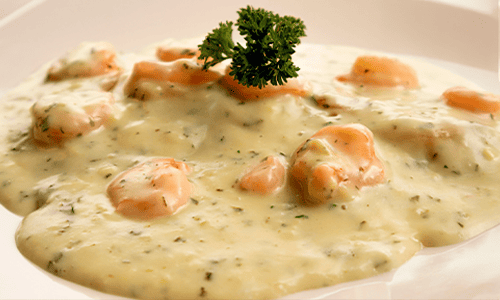 Filete de Tilapia en salsa criolla con camarones